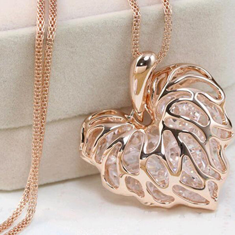 Tomtosh Recently, a woman full of gold silver heart-shaped crystal rhinestone pendant necklace sweater long chain necklace