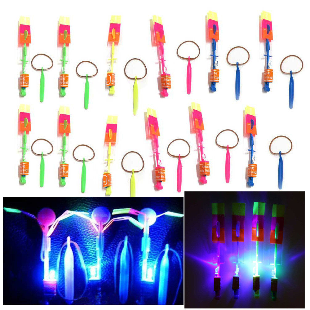 12Pcs/Lot Amazing LED Light Arrow Rocket Helicopter Rotating Flying Toy Fun Night Flashing Fly Arrow Kids Outdoor Flashing Toy